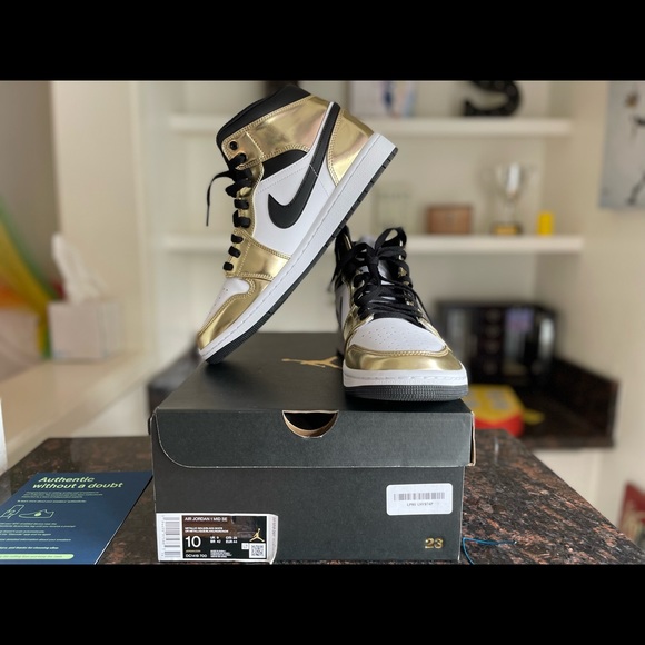 New Nike Jordan 1 mid gold patent. Size 10.